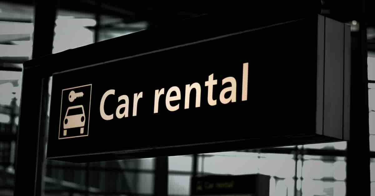 "CheapOAir car rental sign advertising affordable and reliable car rentals."
