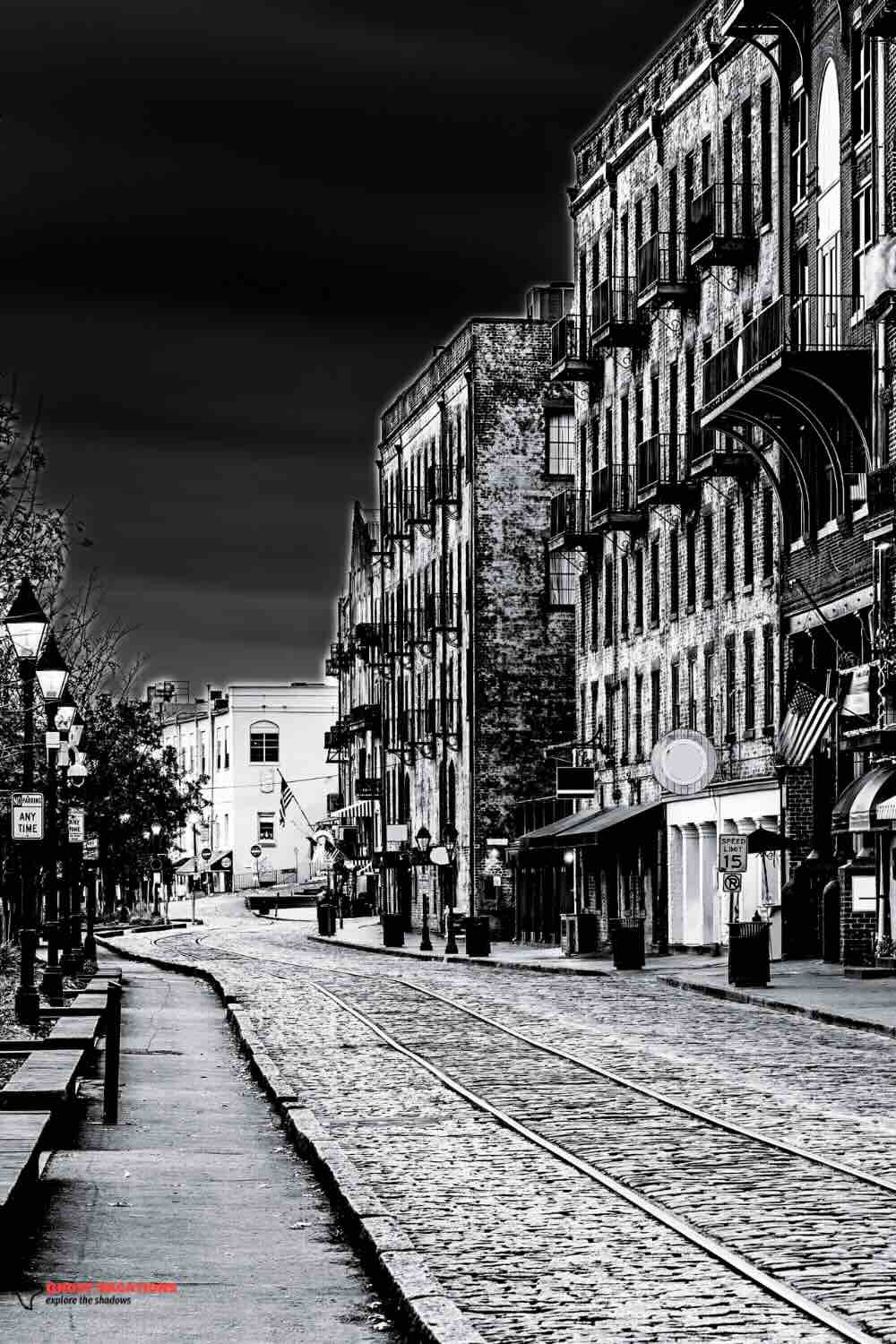"Historic River Street in Savannah, GA, lined with charming pubs and shops, ideal for ghost pub tours Savannah GA to experience eerie tales and vibrant nightlife."