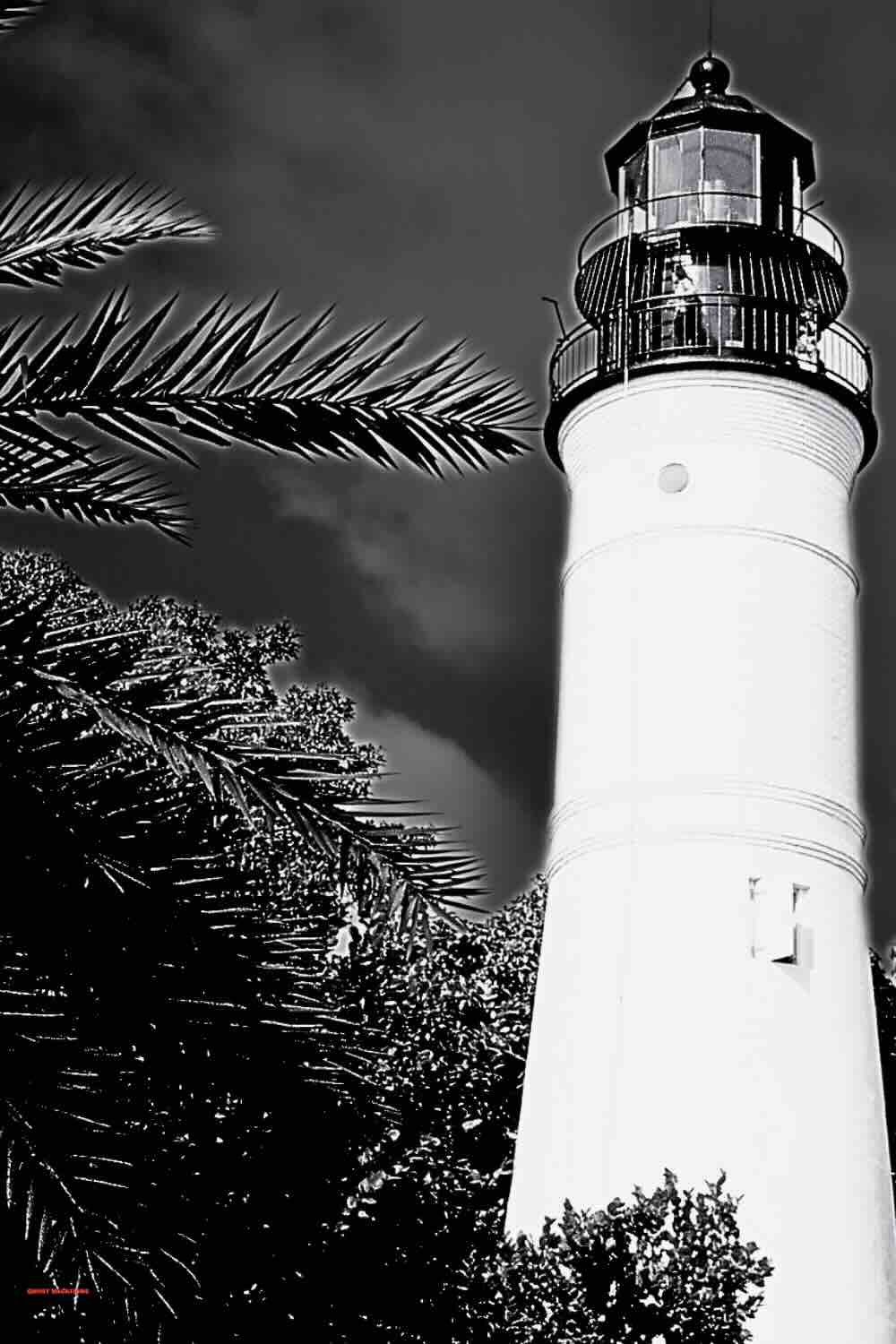 Key West Lighthouse at dusk, a popular stop on ghost tours in Key West FL, known for its eerie stories and haunted legends.