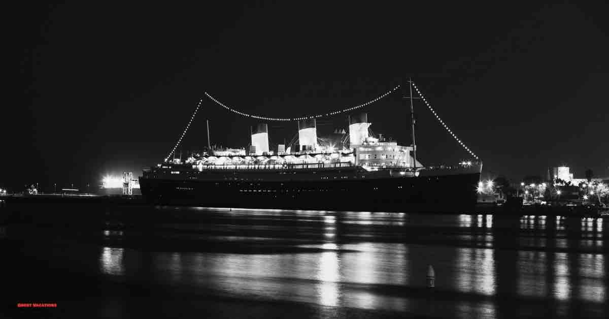 "A misty evening view of the Queen Mary ship, highlighting its storied past and the legendary haunting of the Queen Mary."