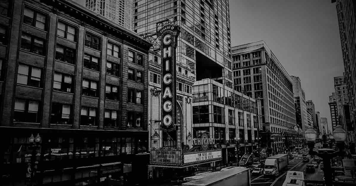 A view of downtown Chicago featuring iconic skyscrapers and historic buildings, some of which house the famous haunted hotels in Chicago, known for their ghostly legends.