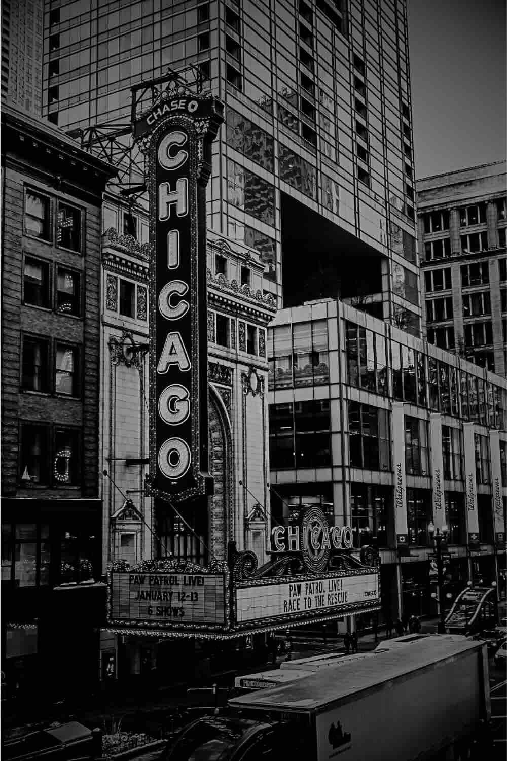 A bustling downtown Chicago scene showcasing historic architecture and modern skyscrapers, home to several haunted hotels in Chicago known for their eerie tales and ghostly encounters.