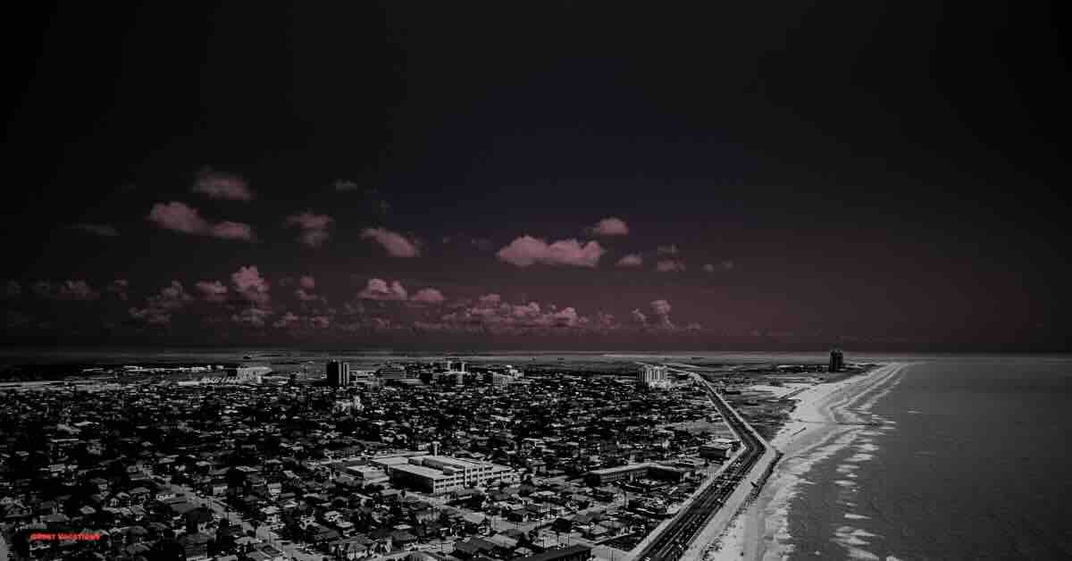 "View of Galveston coastline with a hint of historic charm, showcasing the area around haunted hotels in Galveston."