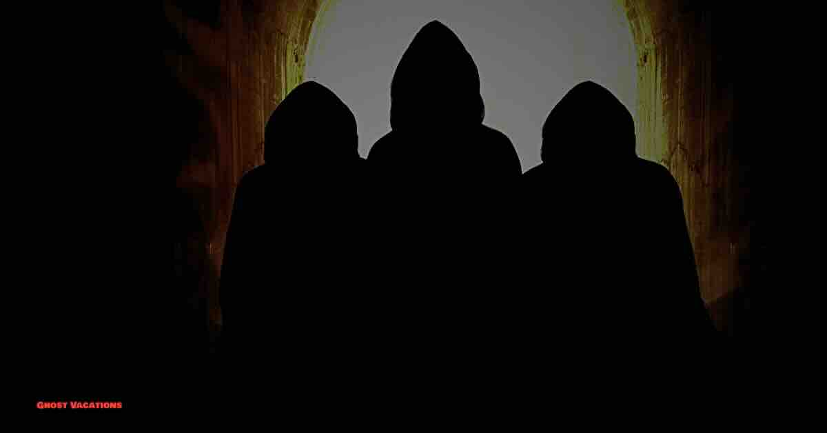 Three silhouetted figures representing the investigators of the Kindred Spirits TV show.