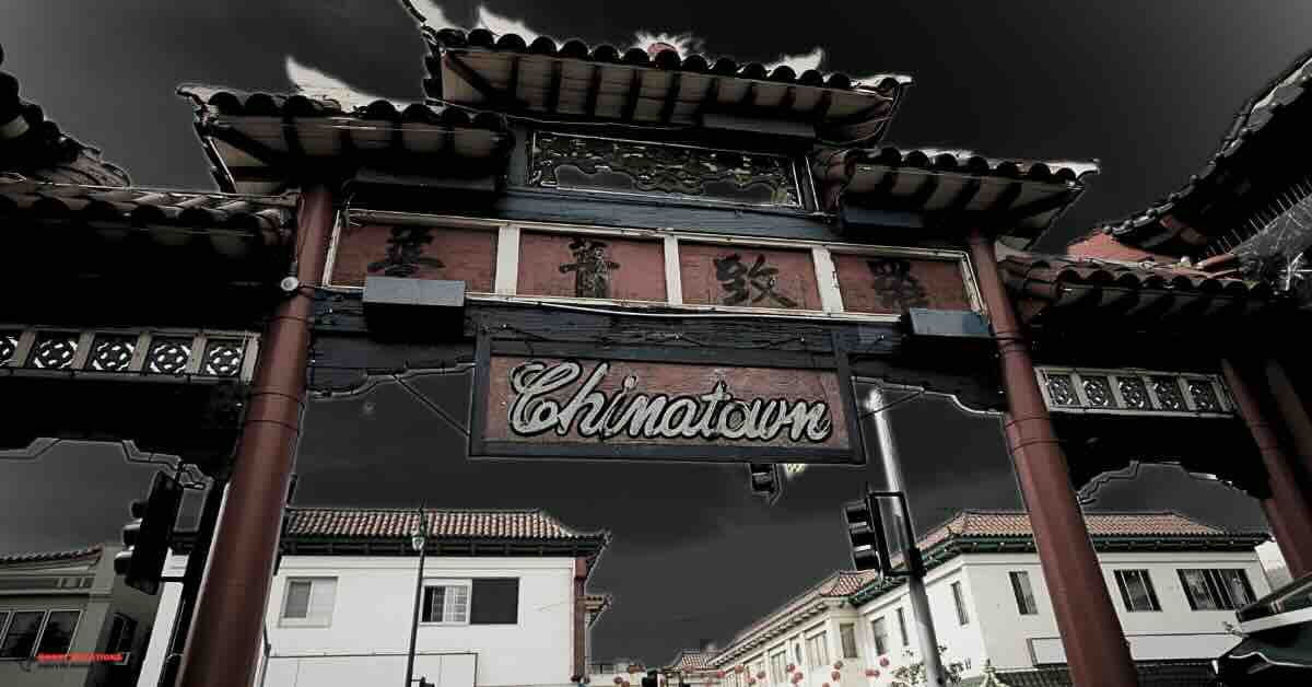 Chinatown's Central Plaza, illuminated at night, featured in the Los Angeles Ghost Tour for its eerie ghost stories and paranormal sightings.